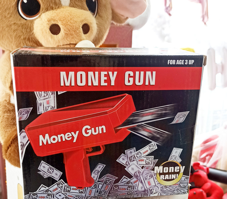 اسباب بازی تفنگ پرتاب پول