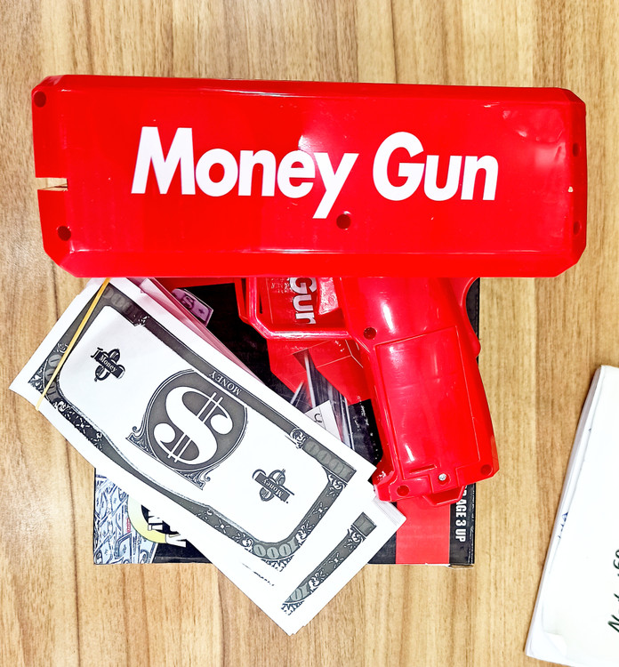 اسباب بازی تفنگ پرتاب پول